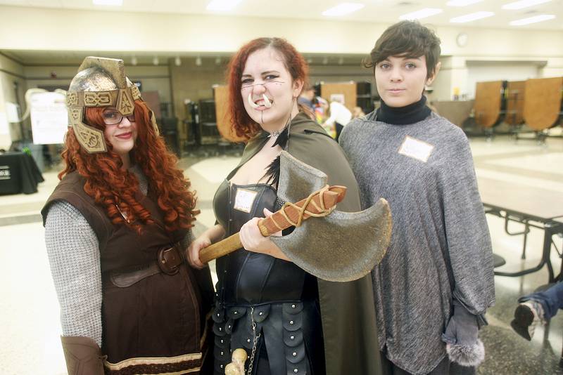 From left, Clara Mount dressed as a dwarf, Vivian Lasken as a barbarian, and April Lasken as an elf for DeKalb Public Library's Fantasy Fest Oct. 4.