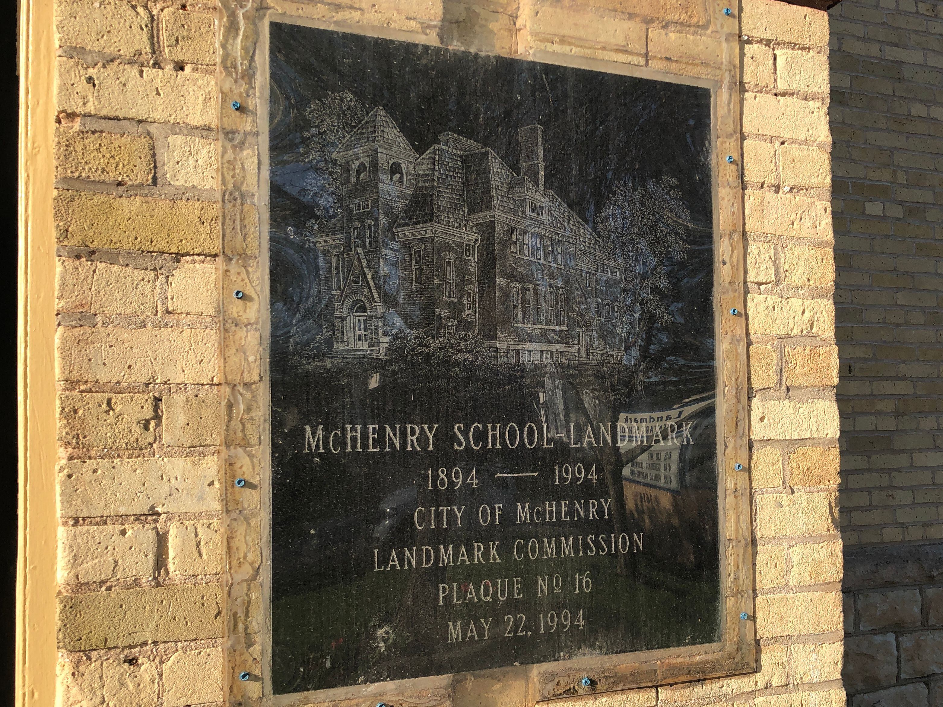 The city of McHenry placed a plaque on the school noting its history in the community in 1994, in recognition of the building's 100th birthday and seen here 30 years later, on Monday, April 15, 2024.
