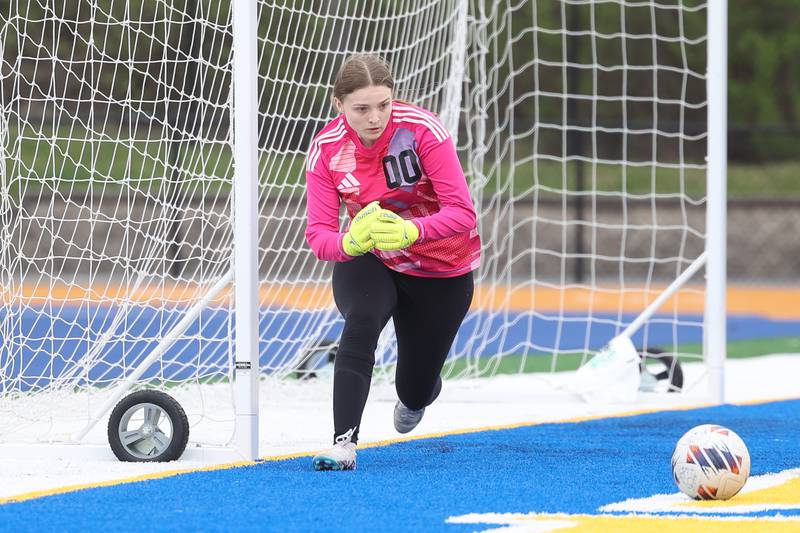 Joliet Central’s freshman keeper Cali Judd runs down the ball against Plainfield East on Thursday, April 11, 2024.