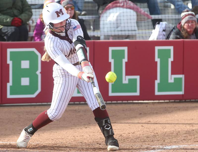 Morris's Mylie Hughes makes contact with the ball against L-P on Monday, April 7, 2025 at the L-P Athletic Complex in La Salle.