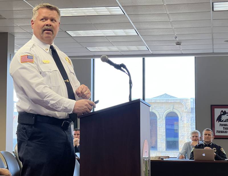 Interim Sycamore Fire Chief Bart Gilmore looks at a powerpoint slide during a May 15, 2023 Sycamore City Council meeting.