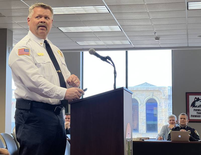 Sycamore Fire Chief Bart Gilmore, then interim, looks at a Powerpoint slide during a May 15, 2023, Sycamore City Council meeting.