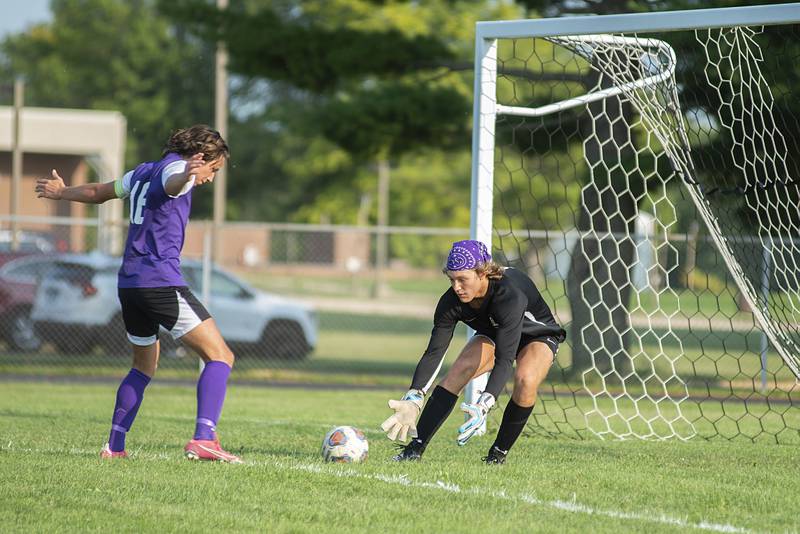 Dixon goalie Rex Blackburn scoops up a shot against Oregon, Wednesday, Sept.14, 2022.