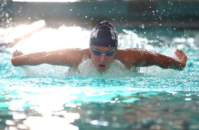 Dundee-Crown co-op’s Maggie Nowak competes in the 100-yard butterfly during the Fox Valley Conference Championship Meet at Woodstock North High School on Saturday, Nov. 2, 2024 in Woodstock .
