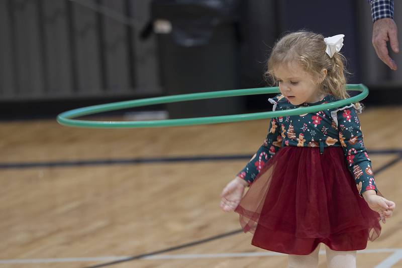 Ellie Williams, 3, of Sterling hones her Hula Hooping skills Monday, Dec. 16, 2024, at during Cookies with Santa at The Facility in Dixon. During the event, an hour of quiet sensory time was held to not overstimulate some of the little visitors.