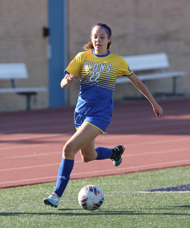 Lyons Township's Peyton Isreal (22) handles the ball during the IHSA Class 3A girls soccer sectional final match between Lyons Township and Hinsdale Central at Reavis High School in Burbank on Friday, May 26, 2023.