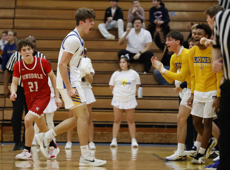 Lyons Township's Grant Smith (14) reacts to a call during a varsity basketball game between Hinsdale Central and Lyons Township high schools on Friday, Dec. 12, 2025 in La Grange.