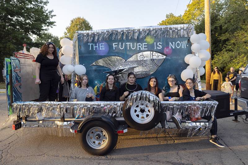 The RFHS art club rides on their float Thursday, October 10, 2024, during the homecoming parade.