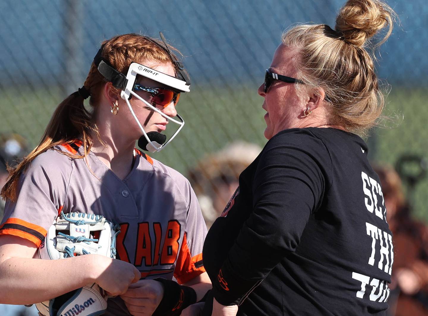 DeKalb softball head coach Erica Swan goes out to talk to her pitcher Cassidy Cavazos Thursday, May 8, 2025, during their game at Genoa-Kingston High School.