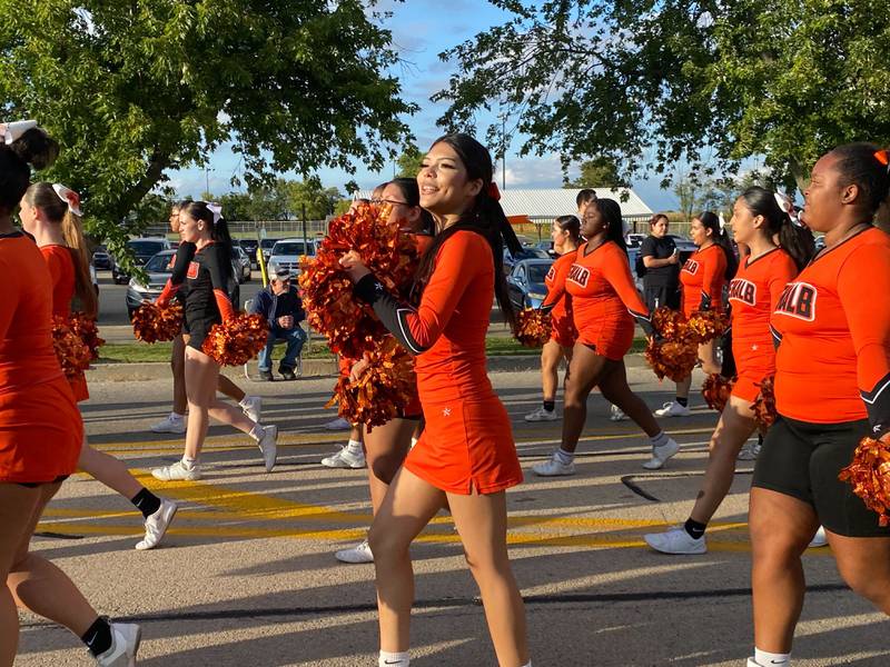 DeKalb Barbs cheerleaders spread some school spirit during the annual DeKalb High School Homecoming Parade on Wednesday, Sept. 24, 2025, along West Dresser Road.