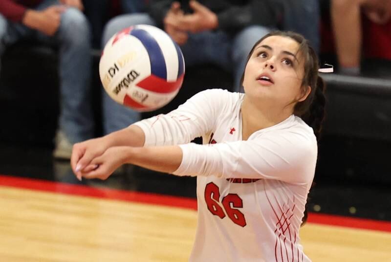 Indian Creek's Audriana DeClue bumps the ball during their match against DePue Thursday night at Indian Creek High School in Shabbona.