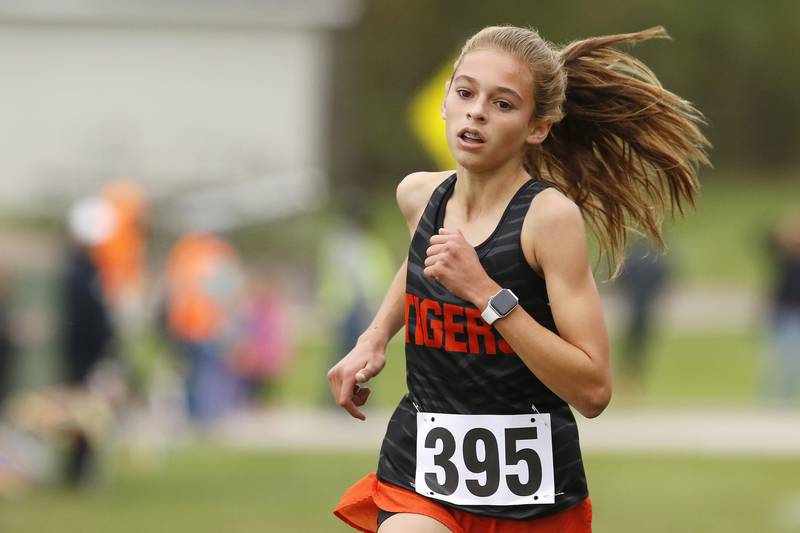 Crystal Lake Central's Hadley Ferrero heads for the finish line to place second during the girls Class 2A Woodstock North XC Sectional at Emricson Park on Saturday, Oct. 30, 2021 in Woodstock.