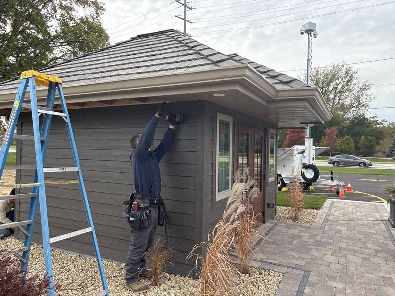 Jeremy Borchardt works on a Shop on Main in Huntley Oct. 28, 2025.