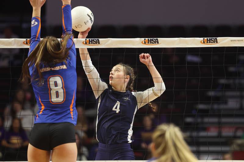 IC Catholic’s Ava Falduto hits a shot against Genoa-Kingston in the Class 2A championship match on Saturday in Normal.