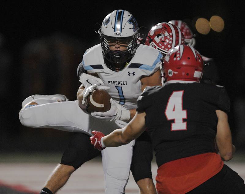 Prospect’s Sebastian Wildhart catches a touchdown pass against Maine South in a Thursday night football game in Park Ridge on September 15, 2022.