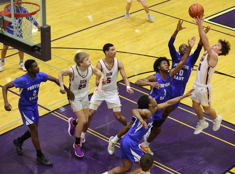 DGN's Owen Thulin (11) shoots during the boys 4A varsity regional final between Downers Grove North and Proviso East in Downers Groves on Friday, Feb. 24, 2023.