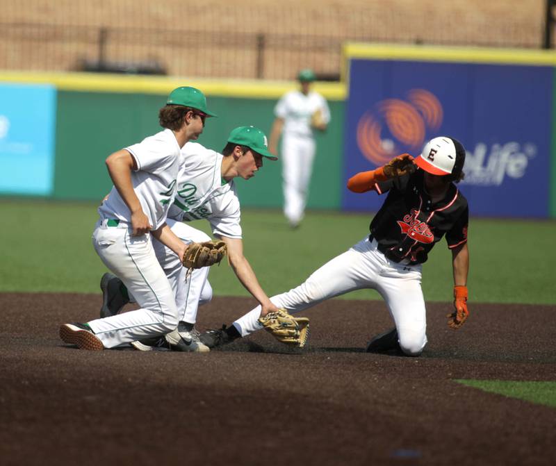 York’s Brian Filosa (center) tags Edwardsville baserunner Lucas Krebs out at second as York’s Josh Fleming (left) looks on during a Class 4A state semifinal game at Duly Health and Care Field in Joliet on Friday, June 9, 2023.
