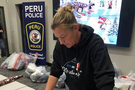 Peru donates $2,500 to Blue and Red Christmas for Kids