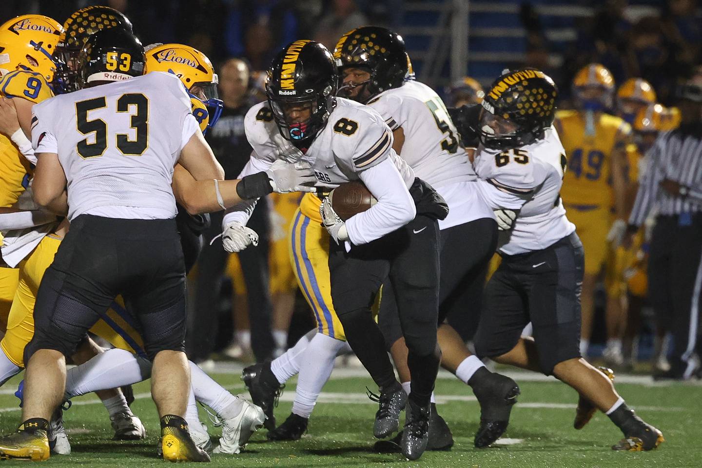 Joliet West’s Taivaughn Johnson cuts back on a run against Lyons Township in the first round of the playoffs on Friday, Nov. 1, 2024 in La Grange.