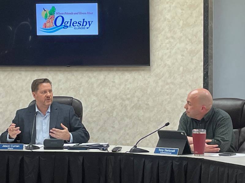 Oglesby Mayor Jason Curran (left) and Commissioner Tony Stefanelli debate the merits of a behavior-conduct policy at the city council meeting April 1, 2024, at city hall. The council tabled the discussion for additional review.