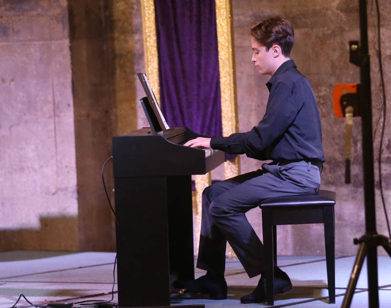 Jordan Britt a senior at Bureau Valley High School plays the piano during the 7th annual Mad Hatter Ball on Friday, Nov. 17, 2023 at the Westclox Event Center in Peru.
