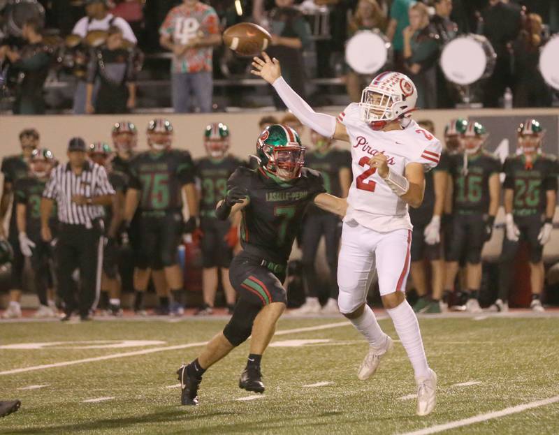 Ottawa quarterback Andrew Vercolio throws a pass over L-P's Gio Legrenzi on Friday, Oct. 3, 2025 at Howard Fellows Stadium.
