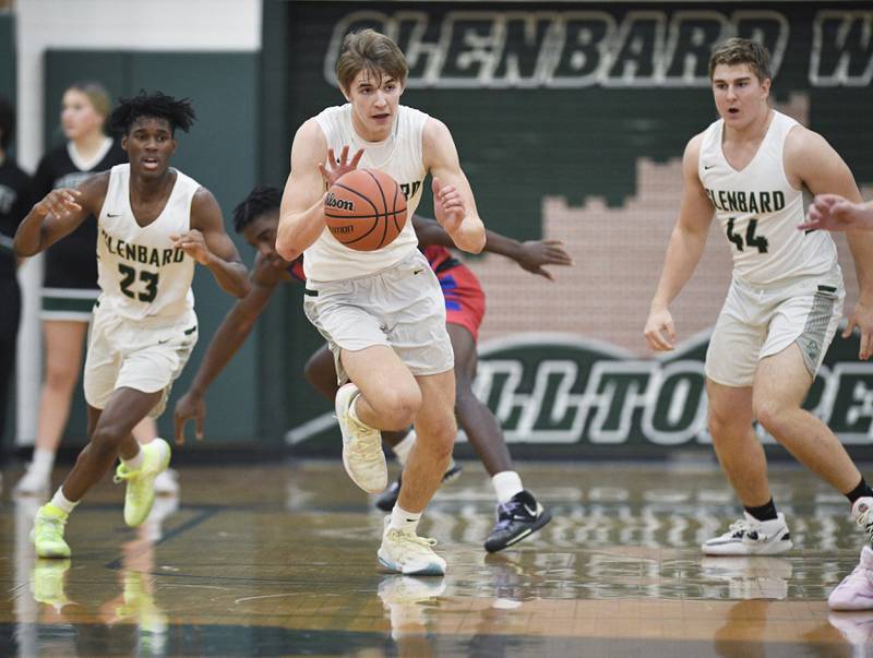 John Starks/jstarks@dailyherald.com
Glenbard West’s Dominick Seaney brings the ball up court against Glenbard South in a boys basketball game in Glen Ellyn on Monday, November 21, 2022.