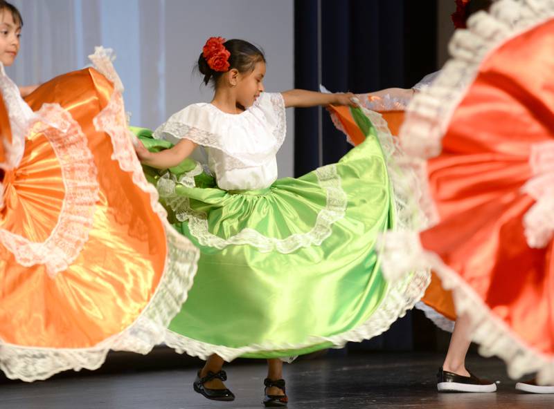Congress Park  students including 2nd grader Jocelyn Patricio dance to celebrate Chipas, Mexico while participating in the  Expo De Bellas Artes held at Park Junior High Friday April 21, 2023.