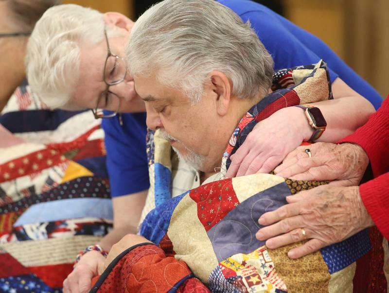 Veteran Tony Jesus Heredia, receives his quilt during the Quilt of Valor ceremony on Saturday, April 19, 2025 at the Moose Lodge in Princeton.
