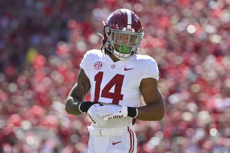 Alabama defensive back Brian Branch runs a play against Arkansas during the 2022 season.