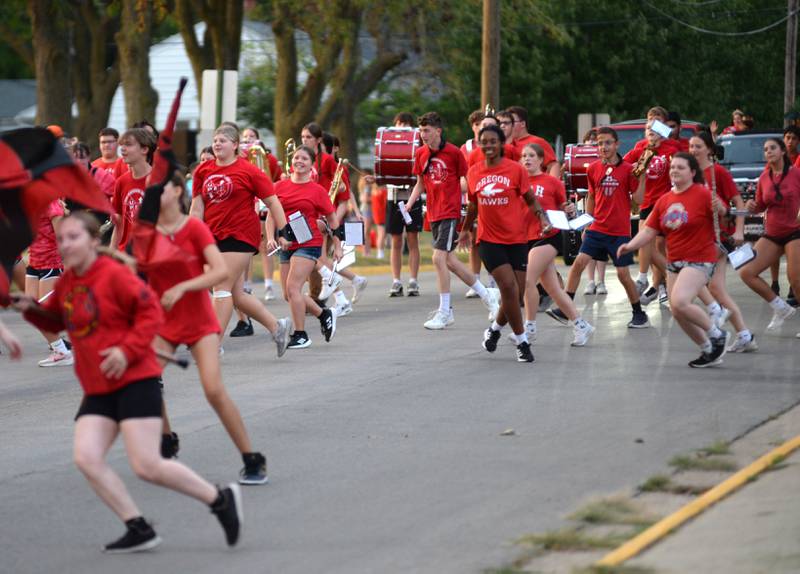 Oregon High School's marching band have some fun as they perform in the homecoming parade on Wednesday, Sept. 18, 2024. Homecoming festivities continue this week.
