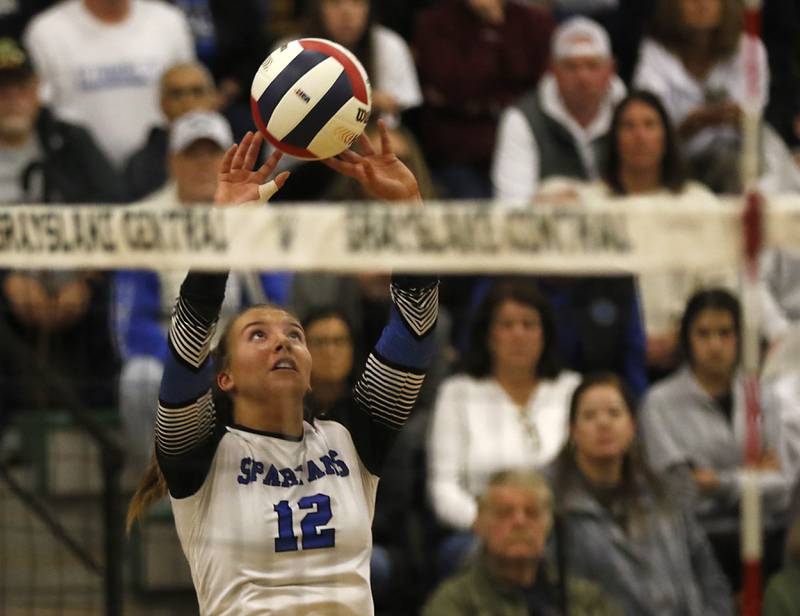 St. Francis' Jenna Glaudel sets the ball during the IHSA Class 3A Grayslake Central Supersectional volleyball match against Prairie Ridge on Monday, Nov. 11, 2024, at Grayslake Central High School.
