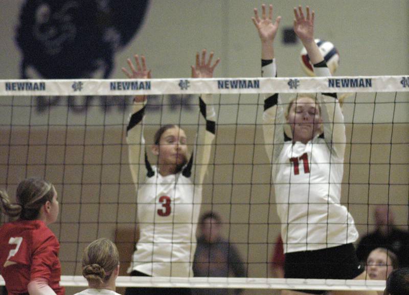 Erie-Prophetstown's  Kallie Wiseley and Lauren Abbott attempt a block at the net. Erie-Prophetstown took on Oregon in the Class 2A regional volleyball semifinal Tuesday, Oct. 29, 2024 at Newman High School.