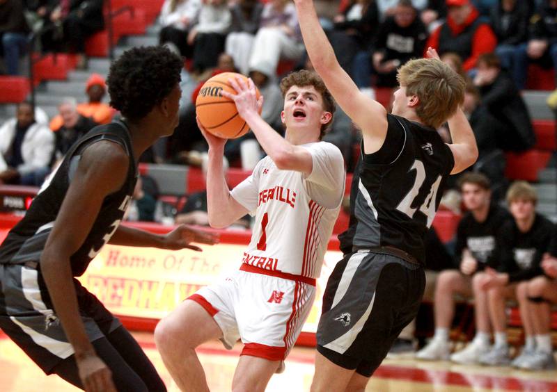 Naperville Central's Tj Hillman shoots the ball during a game against Kaneland on Tuesday, Jan. 14, 2025 in Naperville.