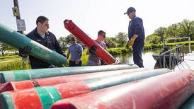 Photos: Fire departments place buoys in Rock River