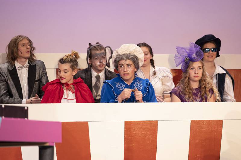 Members of the peanut gallery wait for their scenes during rehearsal Tuesday, Nov. 1, 2022 at Dixon High School.