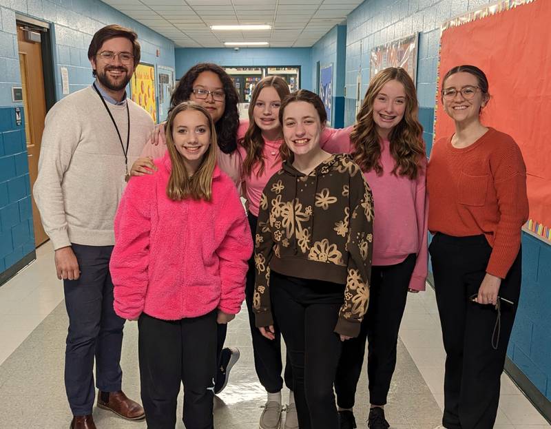 Troy Middle School will send five members of its choir to the IMEA Junior Music Festival. Pictured: (front row L to R) Adyson Gray, Emma Graf (top row) Choir Director Dan Mulligan, Cristhell Gonzalez-De Leon, Taylor Konieczny, Tabitha Witthouse, Choir Director Kelsey Robb