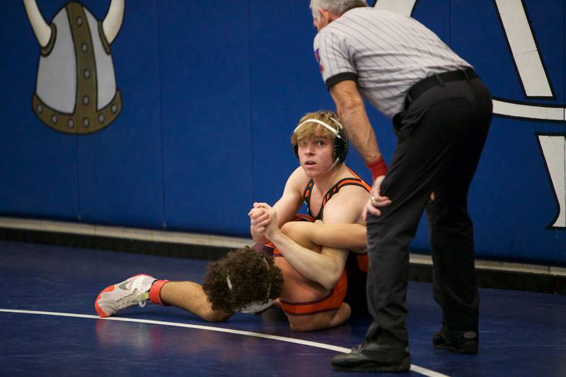 Wheaton Warrenville South's Cooper Hollis competes with Brother Rice's Oliver Davis in the 138 lb. class at the Newbill Invitational on Saturday, Jan.6,2024 in Geneva.