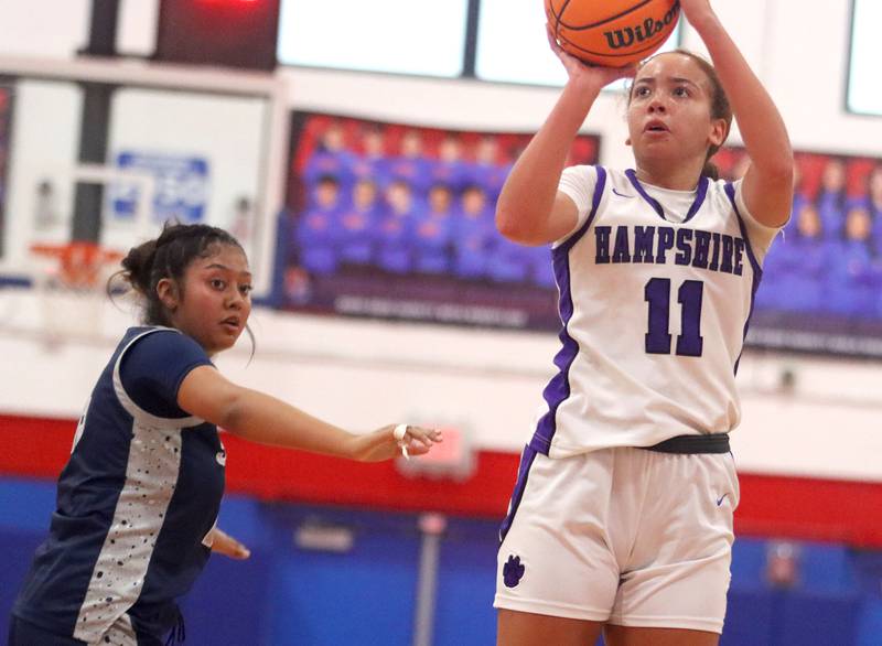 Hampshire’s Mikala Amegasse takes a shot against South Elgin in varsity girls basketball Komaromy Classic tournament  action on Monday, Dec. 29, 2025, at Dundee-Crown High School in Carpentersville.