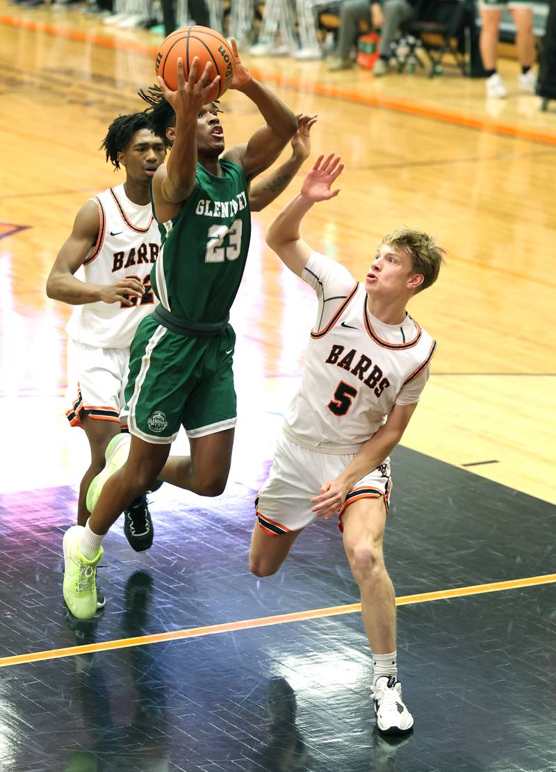 Glenbard West's Benji Zander shoots over DeKalb's Tyler Vilet during their game Tuesday, Nov. 29, 2022, at DeKalb High School.