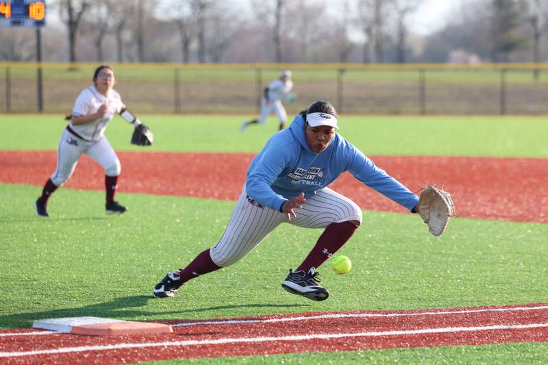 Kankakee's Kaleah Jackson looks to field a ball before it bounces foul during the Kays 20-11 loss to Crete-Monee on Tuesday, April 7, 2026.