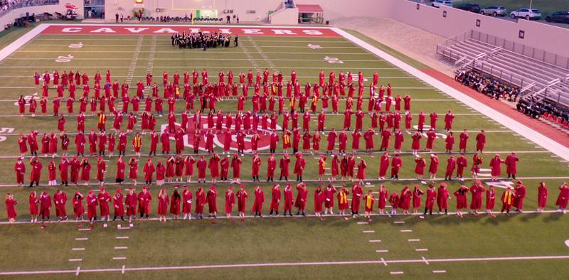 La Salle-Peru Township High School graduates get ready to throw their caps during the L-P Class of 2026 commencement ceremony on Thursday, May 14, 2026 at Howard Fellows Stadium.