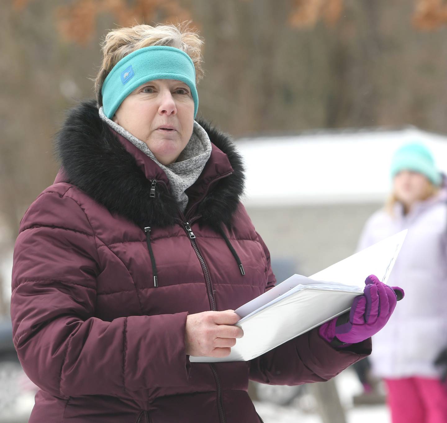 Laurie Perry of the Rochelle chapter of the Daughters of the American Revolution, addresses the crowd at Daysville Cemetery on Dec. 17 during the Wreaths Across America project.