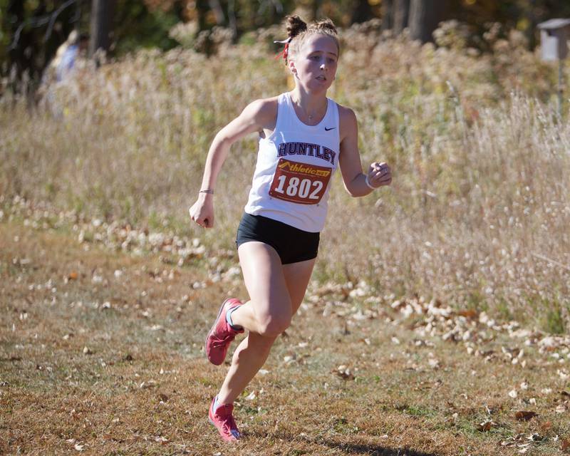 Huntley's Isabella Ciesla heads for the finish line at the Fox Valley Conference meet on Saturday, Oct. 19,2024 at Hickory Nut Grove Preserve in Cary.