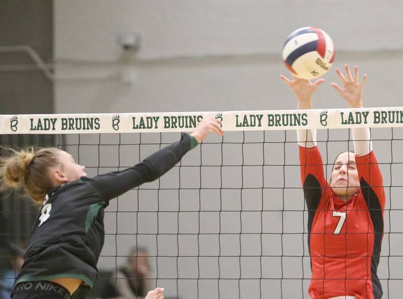 St. Bede's Nellie Potthoff has her spike blocked by Henry-Senachwine's Lauren Harbison during the Class 1A Regional final game on Thursday, Oct. 31, 2024 at St. Bede Academy.