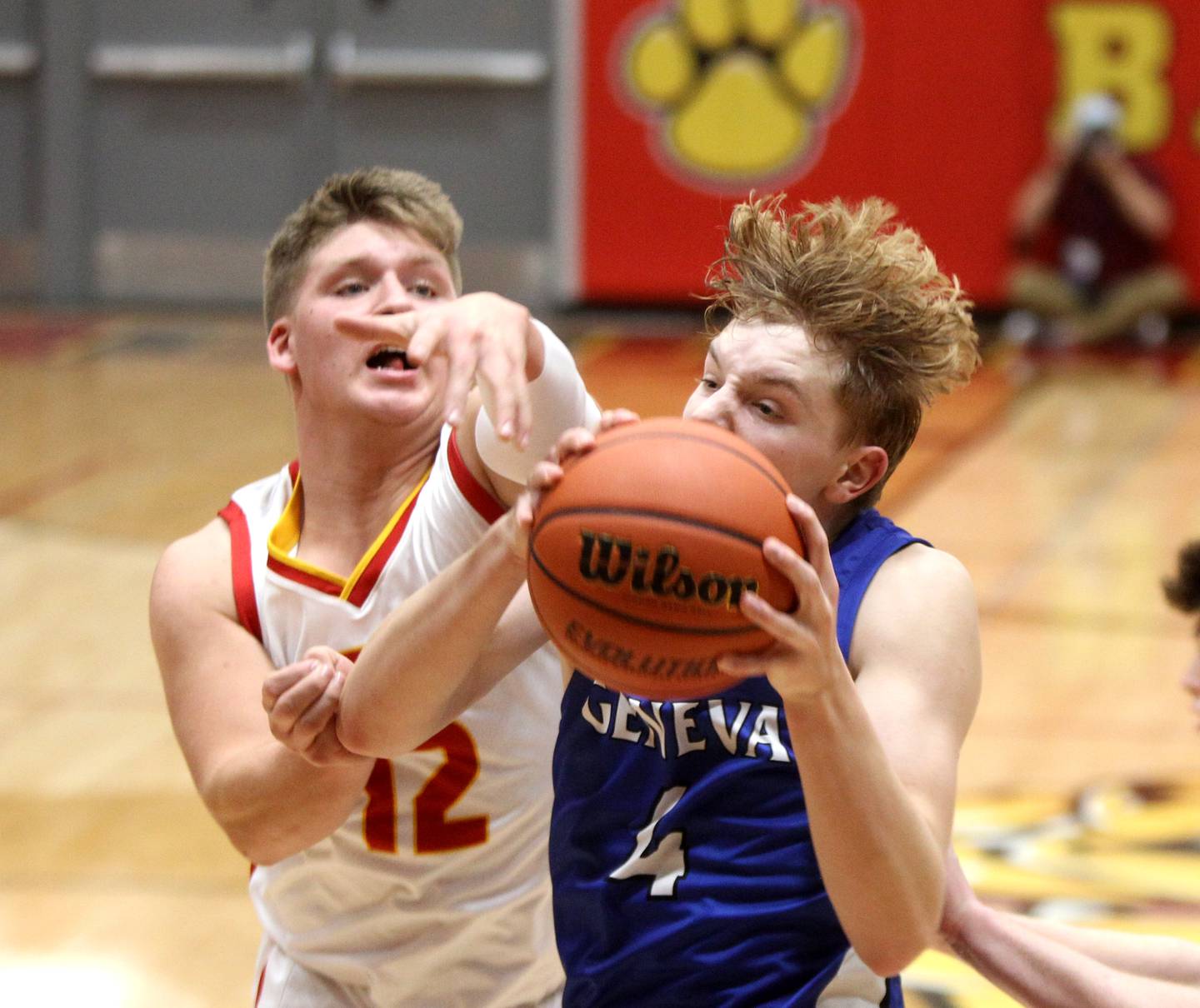 Geneva’s Tanner Dixon (right) pulls down a rebound during a game at Batavia on Friday, Dec. 16, 2022.