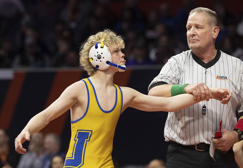 Johnsburg’s Eric Bush celebrates his win over Vandalia’s Max Philpot in the 1A 106 pound championship match Saturday, Feb. 17, 2024 at the IHSA state wrestling finals at the State Farm Center in Champaign.