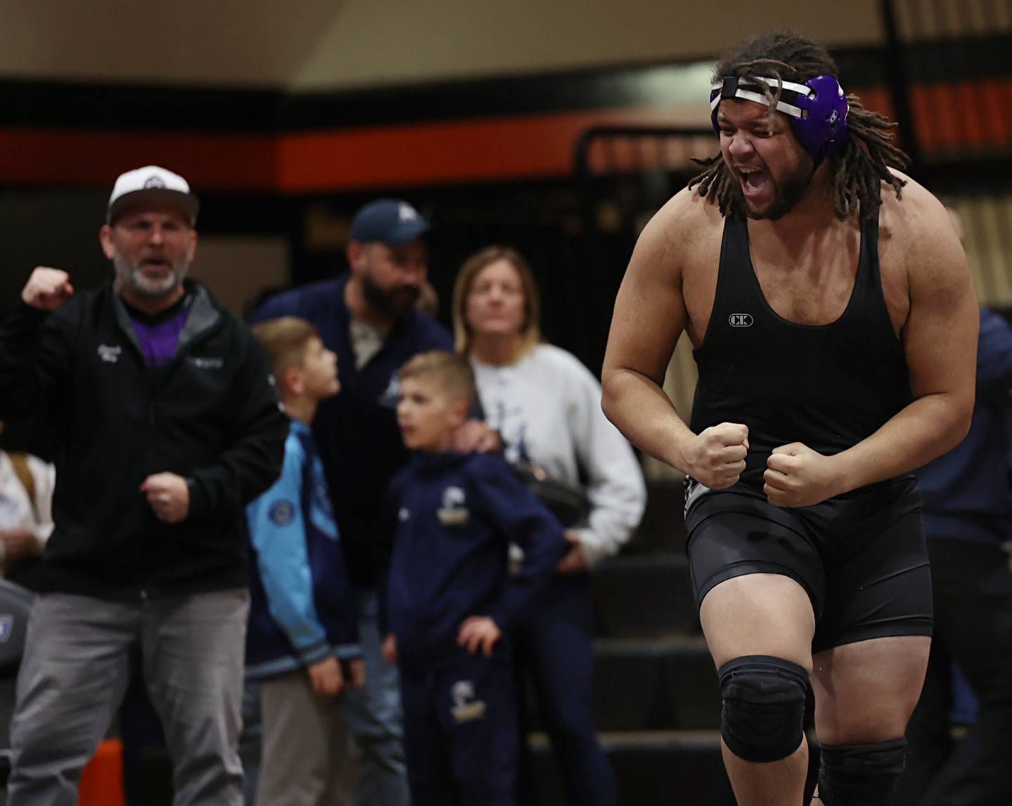 Dixon’s Dylan Bopes celebrates his pin of Richmond-Burton’s Breckin Campbell  in the 285 pound third place match Saturday, Feb. 14, 2026, during the Class 1A wrestling sectionals in Byron.