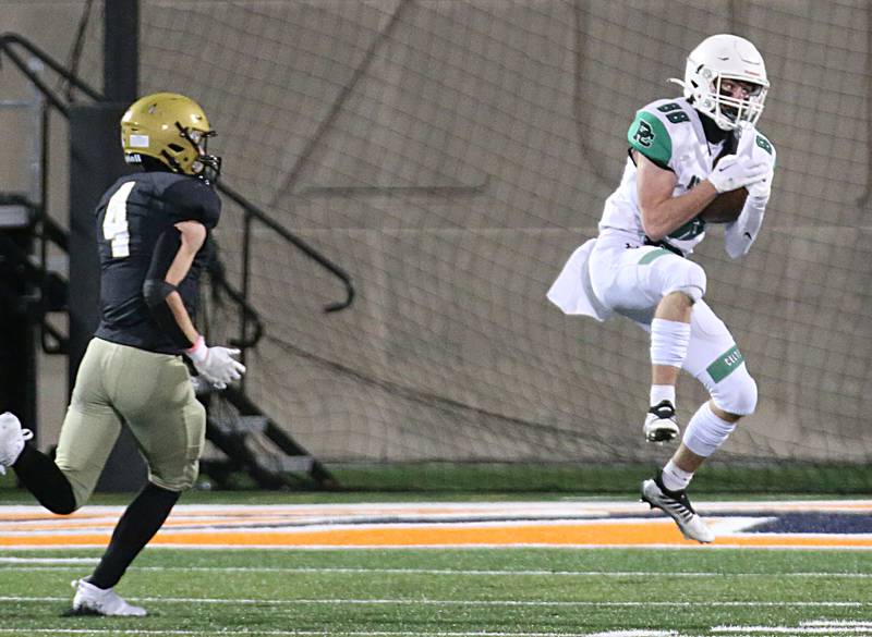 Providence Catholic's Charlie Soltys (88) makes a catch downfield as Sacred Heart-Griffin's Jake Hamilton (4) defends in the Class 4A state title on Friday, Nov. 25, 2022 at Memorial Stadium in Champaign.