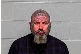 Two men charged in beating at Fox Lake business